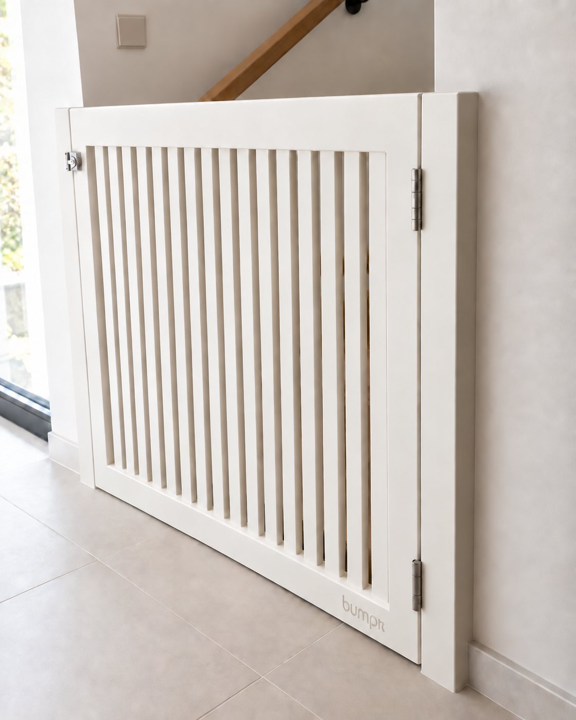 Close-up of the Nord wooden gate in white, showing the slats, hinges and latch